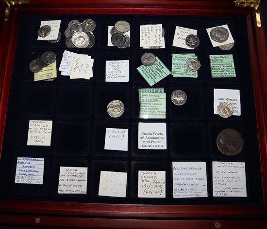 A small collection of Roman and Greek silver and bronze coins, cased with collectors labels (32)